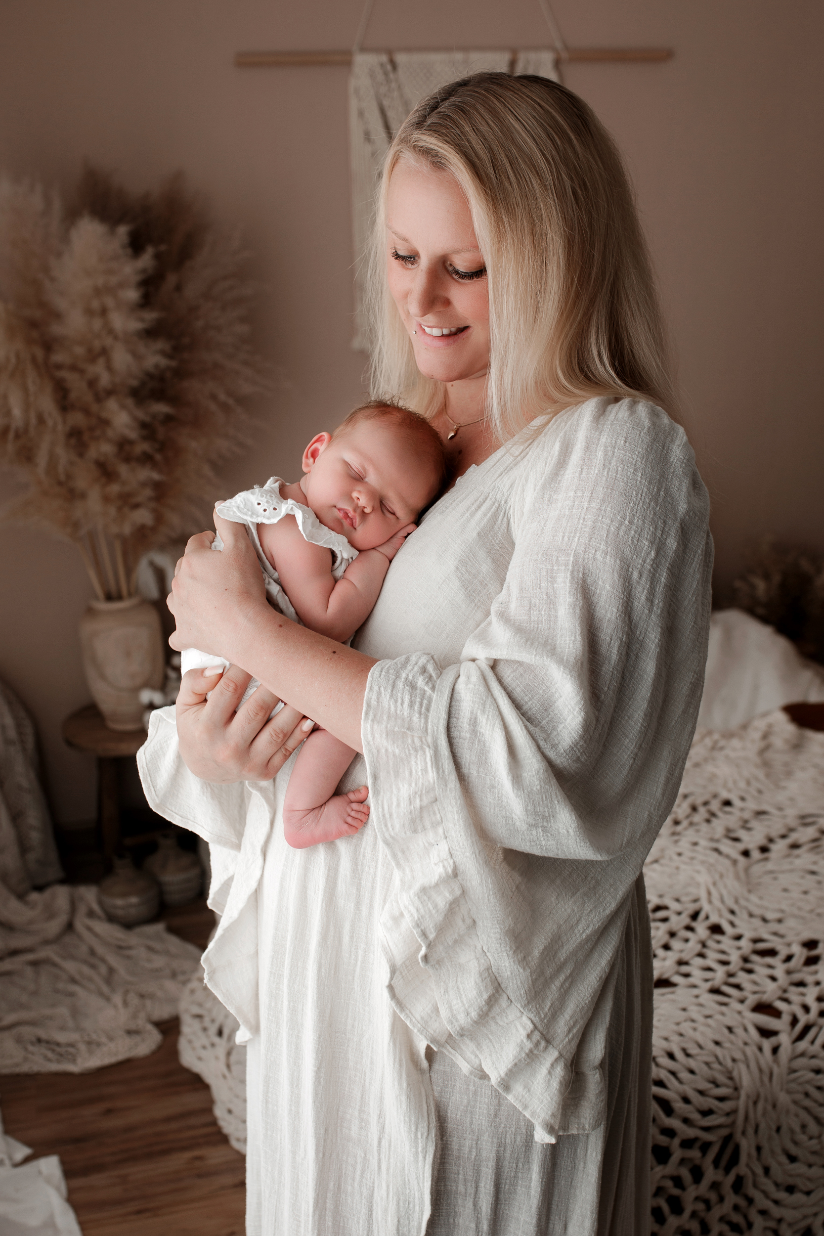 Neugeborenenfotografie mit Mama